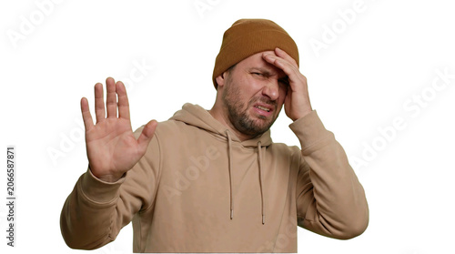Stressed Man In Beanie Gesturing Stop With Hand On Head