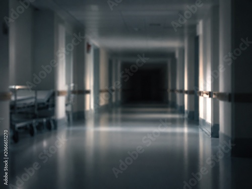 Hospital corridor fading to darkness blurred perspective of