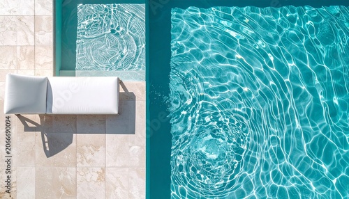 down at a luxury swimming pool, crystal clear turquoise water with sun ripple 