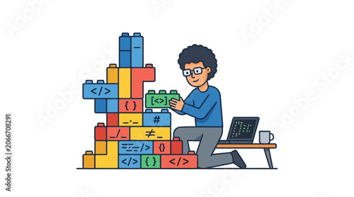 A young programmer building a structure out of colorful coding blocks.
