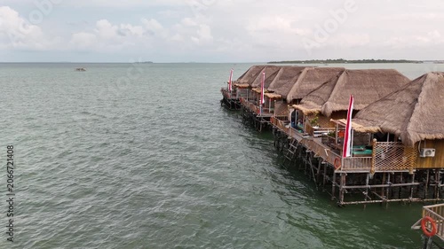 Aerial View of Thatched Roof Bungalows on Stilts at Batam, Indonesia, 4K
