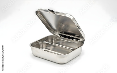 Shiny stainless steel bento lunch box with an open lid showing two separate food compartments on a white studio background