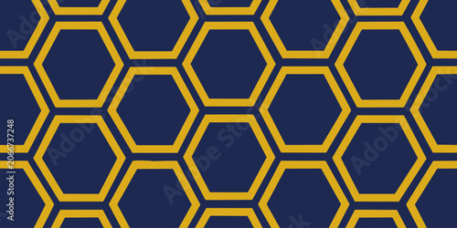 Tableau sur toile A close-up view of a geometric pattern featuring interconnected hexagons in yellow on a dark blue background