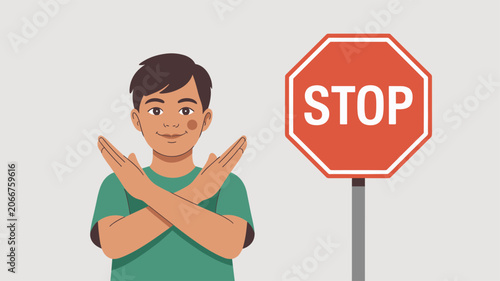 Young boy making a stop gesture with his crossed arms while standing next to a red octagonal stop sign for safety.