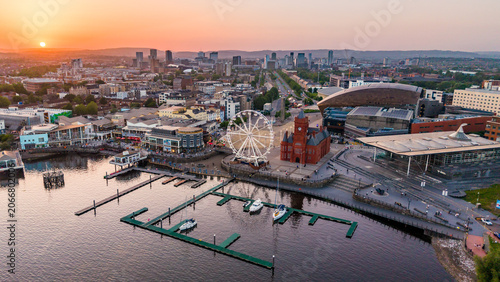 Canvas Print Aerial view of Cardiff Bay waterfront at dusk featuring the Pierhead Building and Ferris wheel