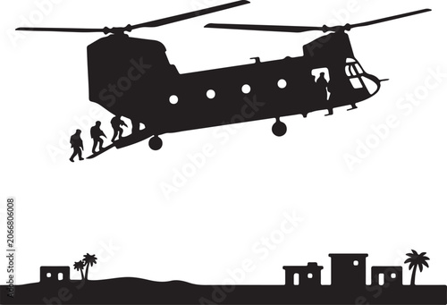 Silhouette of military helicopter with soldiers disembarking over village scene