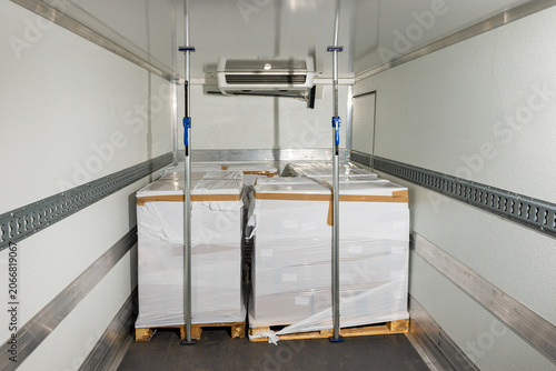 Photos Interior of empty refrigerated cargo truck trailer