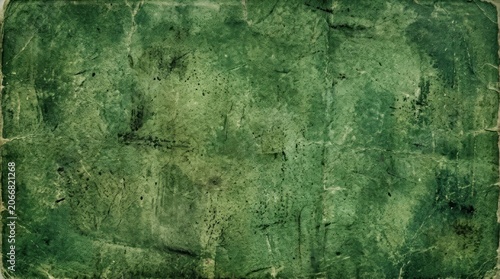 A textured, aged green background resembling old parchment or weathered paper. The surface exhibits a mottled appearance with darker green patches and subtle cracks, suggesting age and wear.