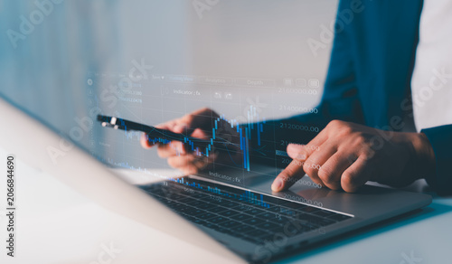 Business financial stock market concept. Businessman analyzing financial data stock market. Business finance stock bar chart Hologram. Business success and growth, economic growth graph.