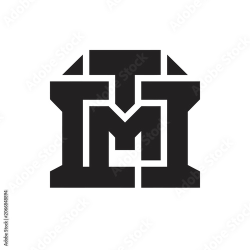 Bold geometric monogram combining letters M and T.
