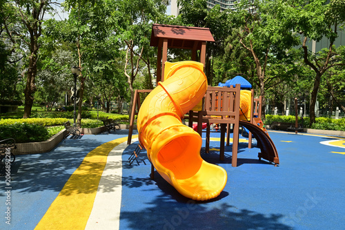 Climbing structures and slides are playground equipment for children, which are part of the public park in Bangkok capital city , Thailand.