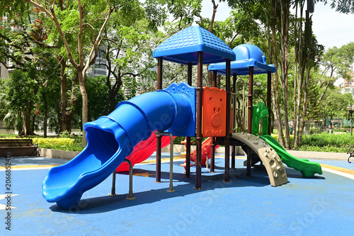 Climbing structures and slides are playground equipment for children, which are part of the public park in Bangkok capital city , Thailand.
