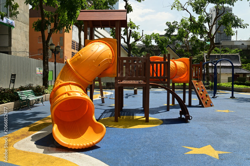 Climbing structures and slides are playground equipment for children, which are part of the public park in Bangkok capital city , Thailand.