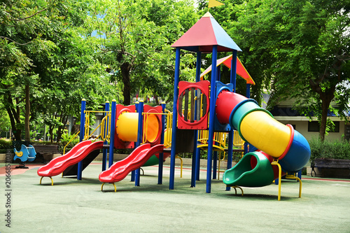 Climbing structures and slides are playground equipment for children, which are part of the public park in Bangkok capital city , Thailand.