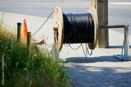 Industrial cable on a wooden reel, which is used for laying networks