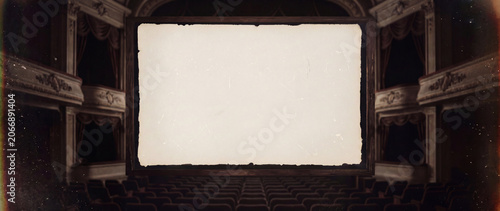 Vintage Movie Theater Interior With Blank Aged Screen and Empty Velvet Auditorium Seats