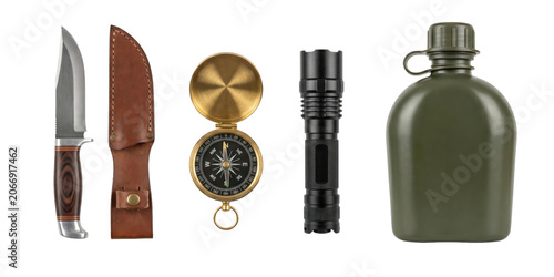 Outdoor adventure tools featuring a hunting knife with leather sheath compass flashlight and canteen isolated on transparent background.