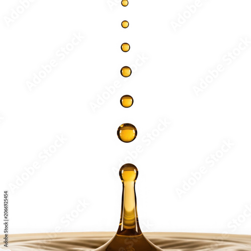 Liquid Droplet Impacting Surface Creating Waves.