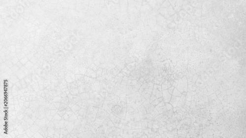 Fotografie Cracked white concrete texture desktop wallpaper with subtle patterns and a roug