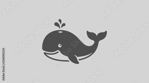 A cartoon whale swims happily in the ocean water.