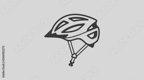 An illustration of a bicycle helmet on a gray background with safety features.