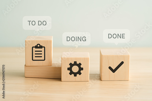Wooden blocks representing to do doing and done tasks with icons displayed