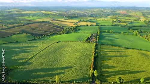 Aerial view of rolling hills and Mourne Mountains during sunset county Down Northern Ireland