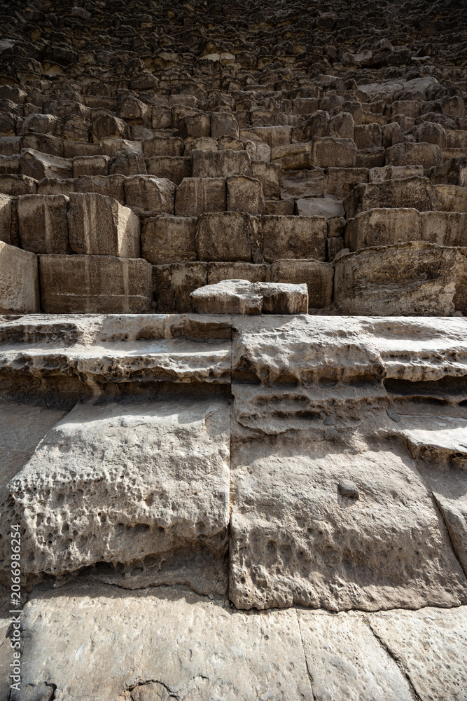 Fototapeta premium Base level stonework of Great Pyramid showing precision in processing of stone blocks, Giza, Egypt