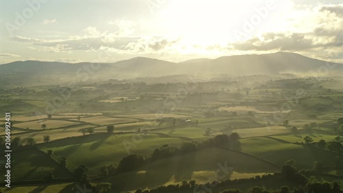 Aerial view of fields and rolling hills during sunset county Down Northern Ireland