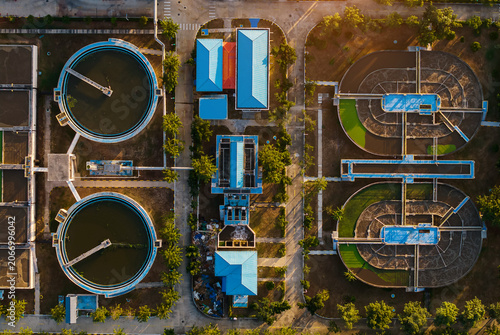 Fotografie Wastewater treatment plant processing water in industrial complex of oil refiner