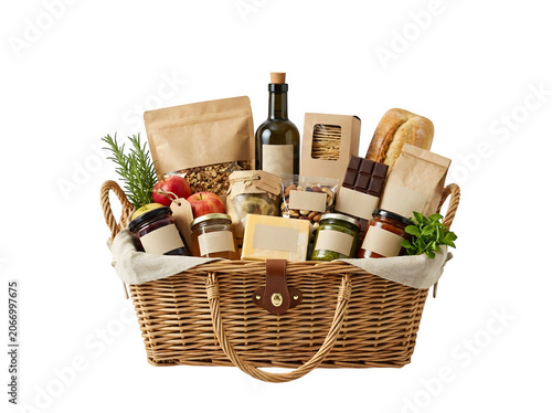 A wicker picnic basket filled with food and drink on transparent background