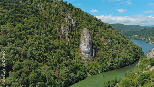 Statue of ancient dacian king Decebal on Danube river