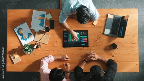 Photos Top aerial view of business man present financial graph to group of smart investors