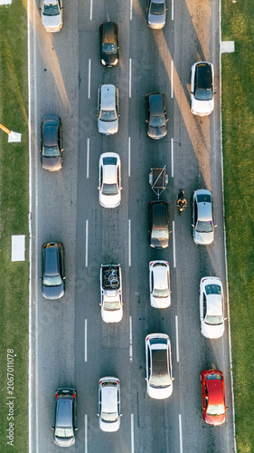 Top Down Aerial View of City Traffic Jam with Multiple Vehicles on Multi-Lane Highway Avenue Street Road