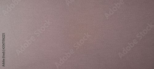 Abstract purple wall texture with a soft light spot