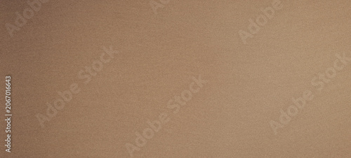 Solid light brown textured paper background
