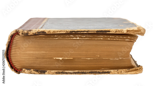 Photos Isolated antique book with a distressed cover and visible aged pages, an old lit