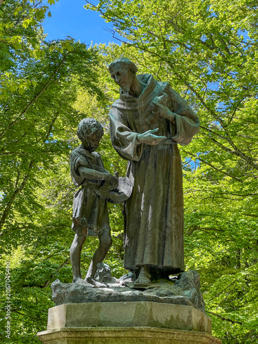 A statue of St. Francis among the trees, near the Franciscan monastery in La Verna, Italy, at the site where St. Francis received the stigmata.