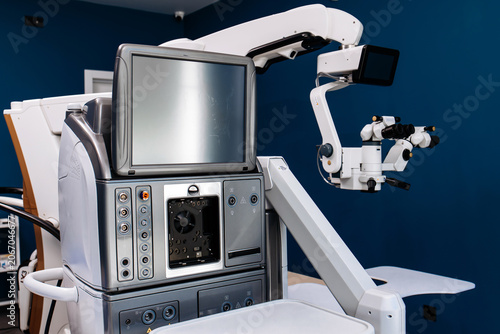 Obraz na plátně Surgical system for eye operations featuring advanced technology with monitor, c