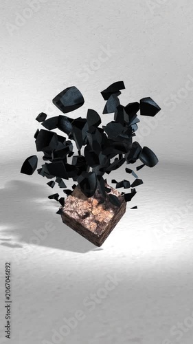 Black sphere exploding over a balancing stone cube