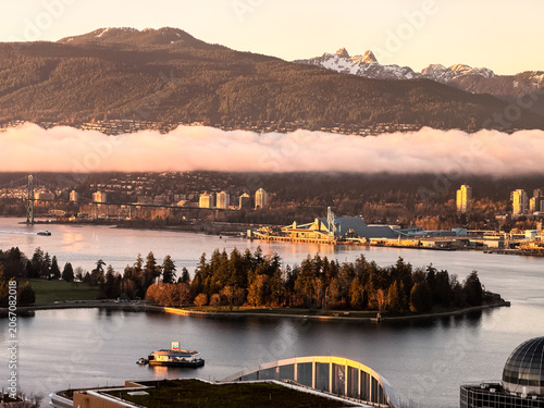 Vancouver sunset aerial view with Lions Gate Bridge and Stanley Park