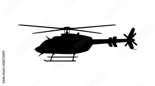 Black silhouette of a helicopter on with rotors and tail
