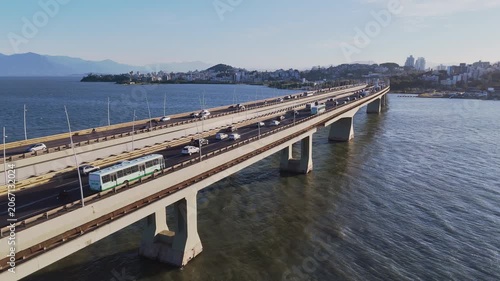 Aerial View of Pedro Ivo Campos and Colombo Salles Bridges with City Traffic and Ocean Coastline in Florianopolis Santa Catarina Brazil