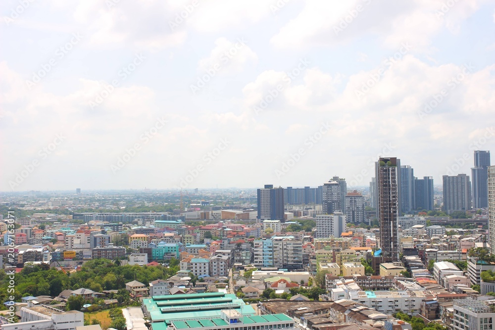 Fototapeta premium High-rise condominiums and urban cityscape around BTS Phra Khanong in Bangkok, Thailand