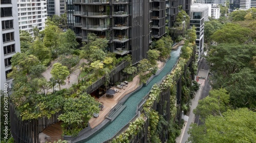 Modern high rise residential building integrates extensive vertical greenery and rooftop landscaping features