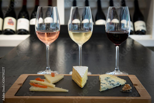 Elegant Cheese and Wine Pairing at a Charming Winery During a Sunny Afternoon