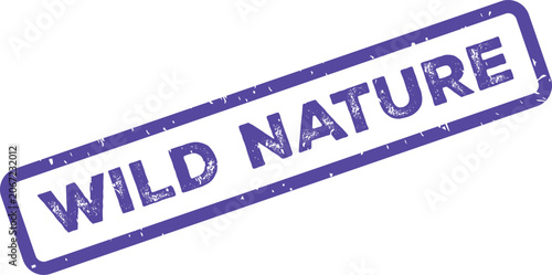 Fotografie A purple rubber stamp with the distressed text WILD NATURE is displayed against