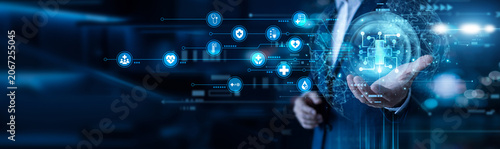 Fotografie Doctor hand holding HEALTHTECH network devices