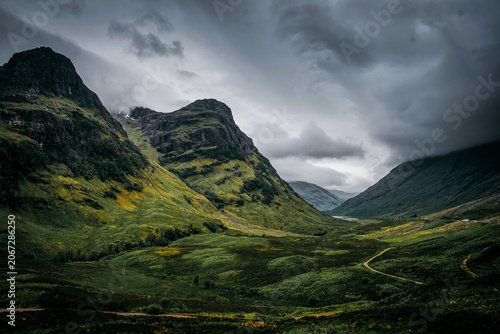 Bild auf Leinwand Dramatic, moody terrain of Glen Coe in the Scottish Highlands.