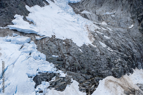Slika na platnu High Alpine Glacier Ice and Rocky Mountain Slope in British Columbia Canada With